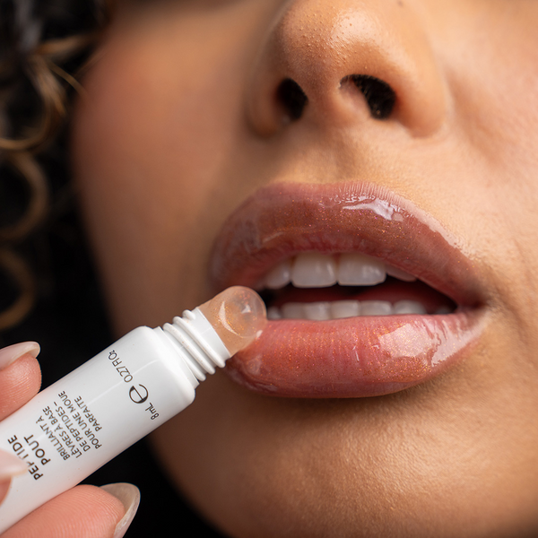 Nu Colour® Peptide Pout - This shimmering, rosy tinted gloss visibly volumizes for plumper, fuller-looking lips.